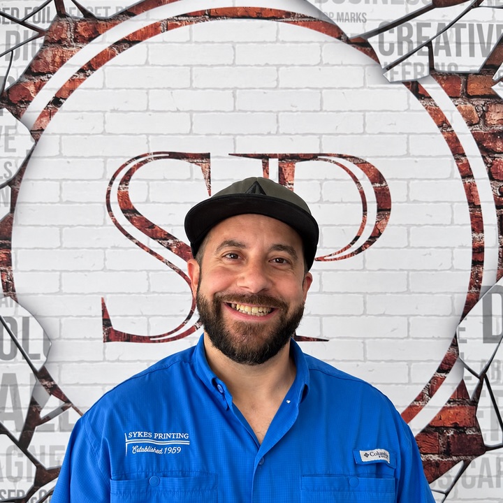 Adrian, Chaos Coordinator-in-Chief at Sykes Printing